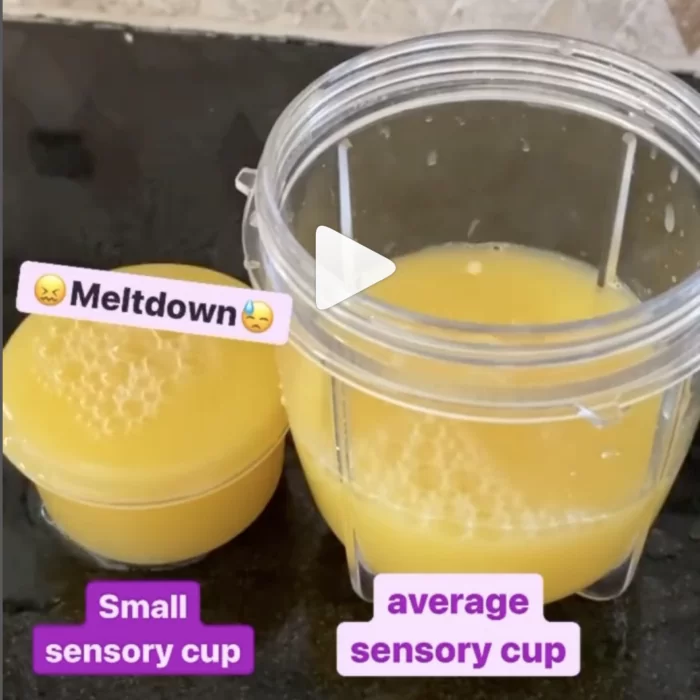 A small cup labeled "small sensory cup" overflowing with orange juice with text that says "meltdown" next to a large cup with orange juice only filled at the bottom that says "average sensory cup"
