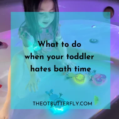 Blog post "What to do when your toddler hates bath time" lay over photo of girl in bathtub wearing a pink bathing suit and playing with glowing toys.